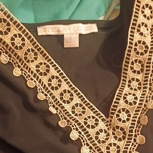 Stellah Black Top with Gold Crochet V-Neck